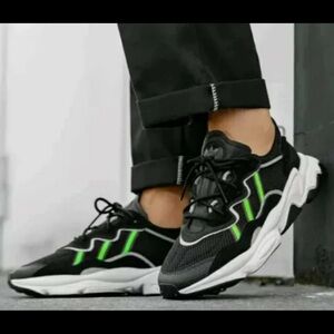 Black and Neon Adidas Osweegos women's size       6.5 (kids 4.5)